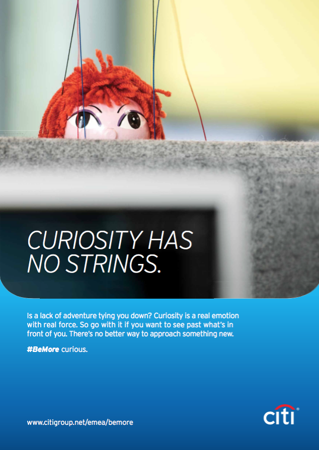 A Citi motivational poster showing a puppet on strings with the reminder that "Curiosity has no strings."