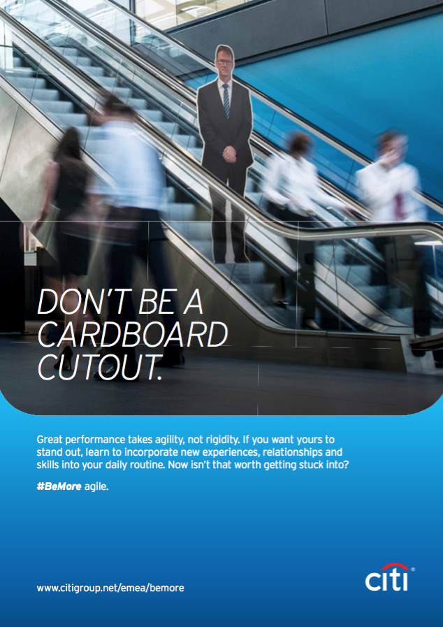 A Citi motivational poster showing a cardboard cutout person with the call out “Don't be a cardboard cutout.”