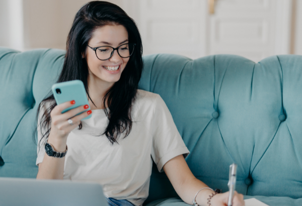 Woman learning and taking notes