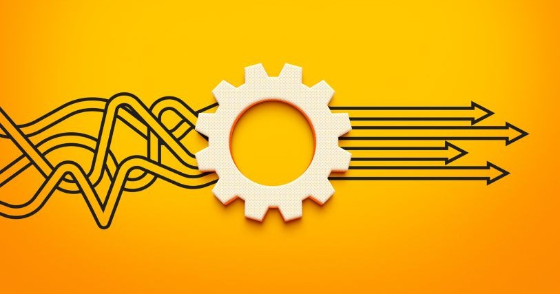 Against an orange background, a tangle of black lines runs through a gear, representing process, emerging as straight arrows pointing forward