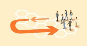 A group of employees stands at one end of a wide orange line with arrows showing the path way, a curve back, and the return to the group